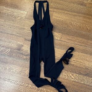 FP Movement Black Strappy Jumpsuit. NWOT. 
Size XS/S